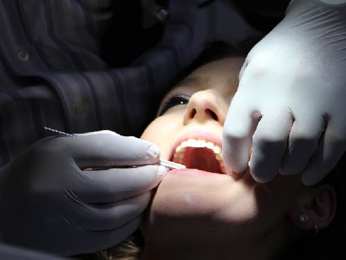 woman getting dental work root canal